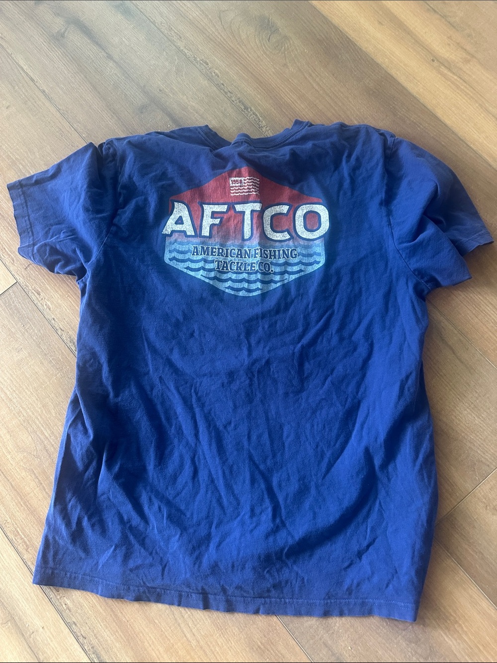 AFTCO Navy Blue Tee with Red & White Logo